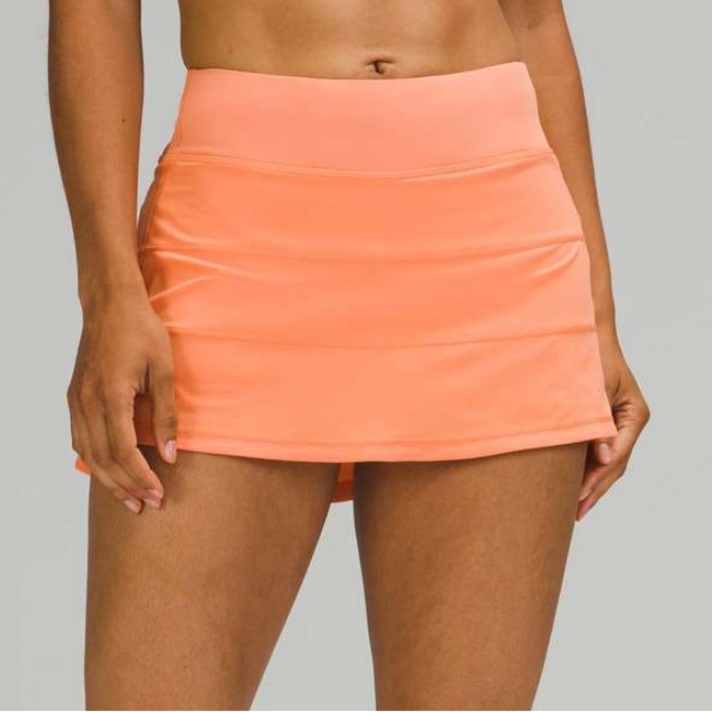 Excellent condition Rare Golden Apricot lululemon pace rival skirt. Reg length